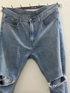 Ripped Knee Jeans