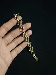 Elegant Gold Finish Bracelet with Multicolour Ston