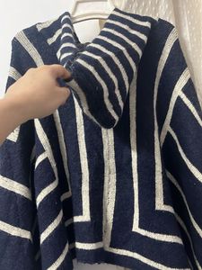 Striped Poncho with Buckle Detail