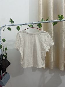 Loose fitting crop top.