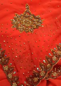 Elegant Orange Embellished Saree