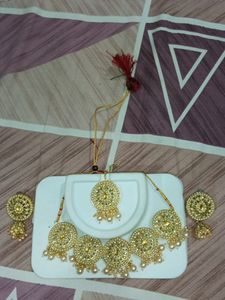 Neckless