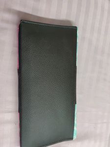 An Ikkat Ladies Wallet  With Multiple Pockets