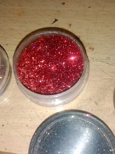 Elegant Jhumka Earrings and nail glitter