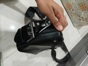 A Cute black Grungy Sling Bag