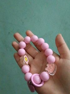 Pink Beaded Bracelet And Phone Charm
