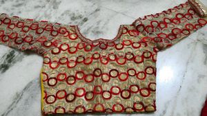 Red saree with stitched blouse