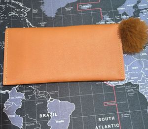 Brown Studded Wallet with Pom