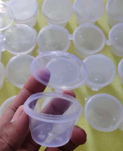32 Small Plastic Containers with Lids