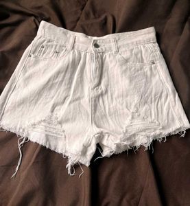 Torn White Denim Shorts