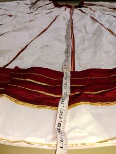 Maroon &amp; white lehenga choli.