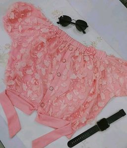 skirt or shorts with floral embellishments.