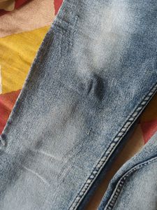 Scratched Denim Blue Jeans