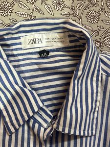 Blue and white striped shirt