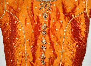 Elegant and traditional floor-length dress.