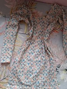 A Stitched Suit With Square Neck