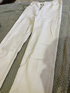 Urbanic Cream Solid Denim Jeans – Straight Fit (M)