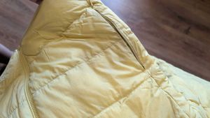 Uniqlo ultra light down jacket in butter yellow