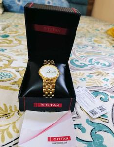 unused Titan Gold Watch