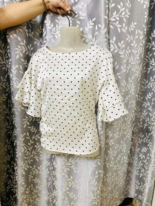 Ruffle Sleeve Top Available On Coins