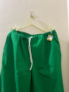 Black top and Green Casual Pants