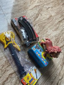 Mixed Toy Bundle - Train Set, Guitar, & More!