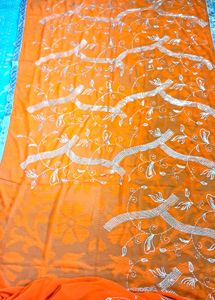 Orange  Saree  With Sitara  Work .