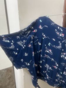 Blue Top With White Graphics