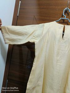 Beautiull cream kurti with neck work