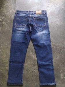 Ripped Blue Denim Jeans