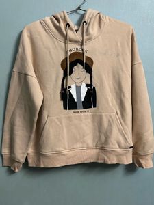 Beige Graphic Hoodie with Braided Girl Print