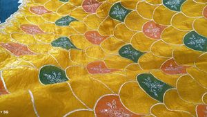 party wear gold crush saree