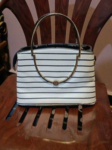 Enigma Striped Handbag 👜
