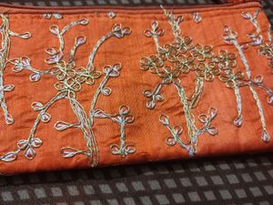 New Embroidered Orange Pouch