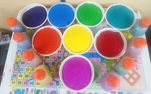 Colour Rangoli With Cute Bottles