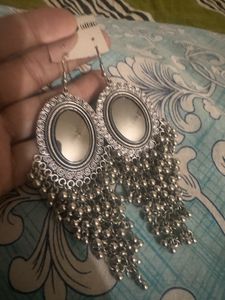 Long silver finish earrings