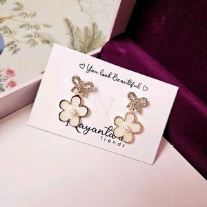 Korean Studded Bow With Dangling Flower (White)