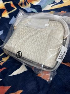 MK SLING BAG
