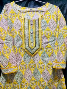 Women&#39;s Knee-length Kurta With Embroidered Yoke