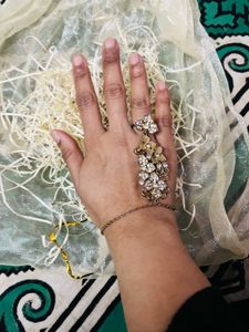 RING WITH HAND DESIGN