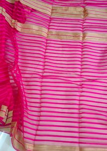 Dark Pink Saree With Light Brown Border.