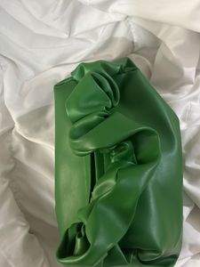 green scrunched hand bag