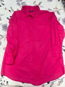 oversized pink shirt.