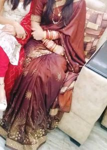 Beautiful Saree With Stitched Blouse.