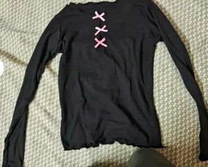 A Black Crop Top With Cute Pink Bow