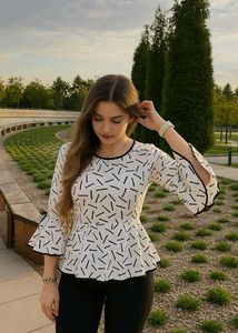 🤍✨Price Drop! Peplum Top - Geometric Print