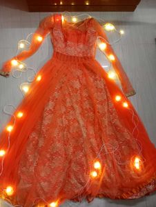 Orange color embroider gown for Women