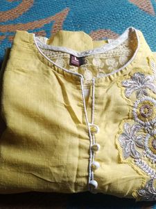 Yellow Kurta With Patched Flowers Design