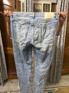 Distressed Denim Jeans
