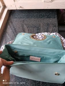 Oriflame Sling Bag. .. 1 Another Belt Also Given